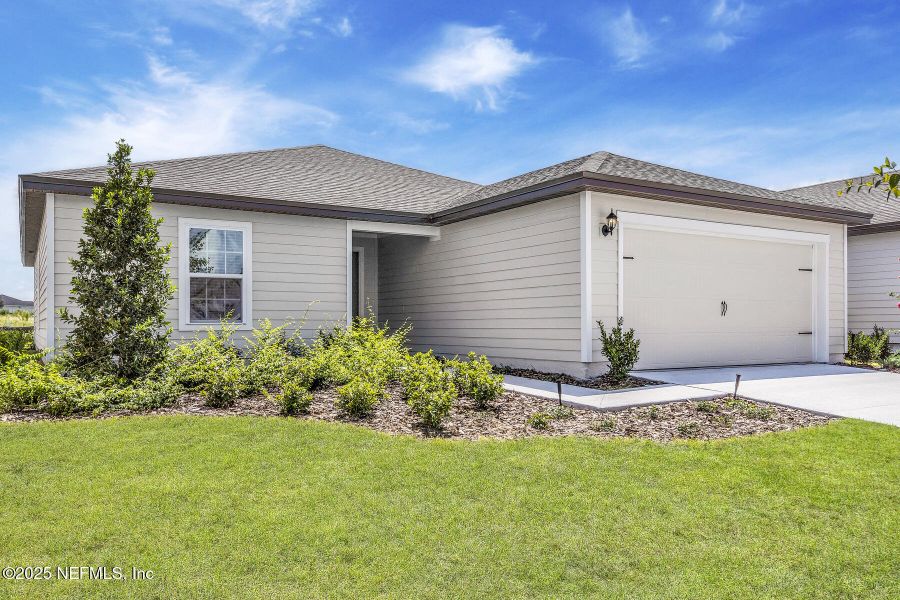 Front exterior of a new home in Rolling Hills, Green Cove Springs, FL, highlighting curb appeal (Image 1).