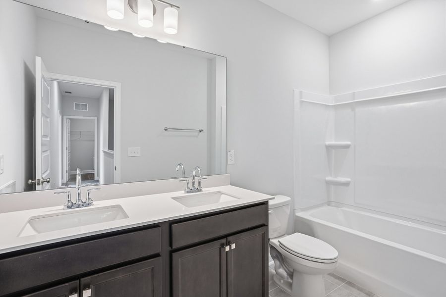 Furnished interior view inside a new home in Renaissance at White Oak, Garner (Image 11).