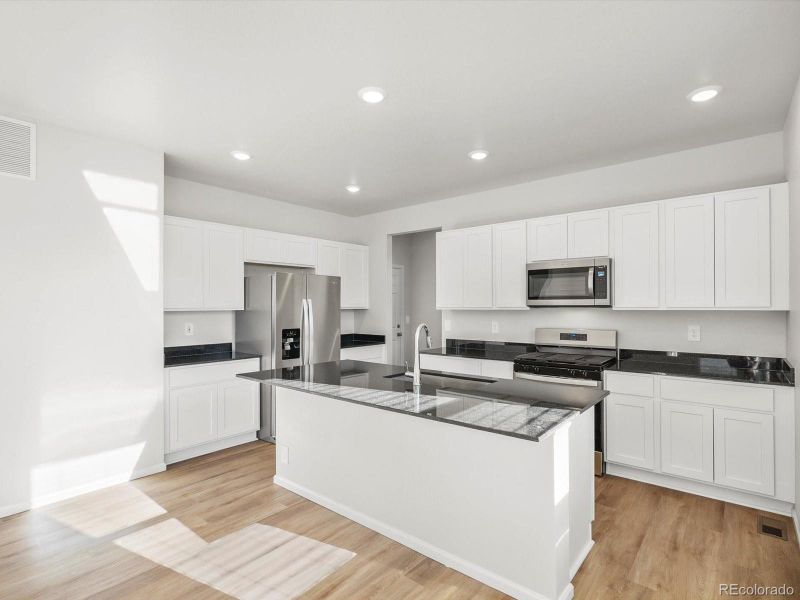 Furnished interior view inside a new home in Revere at Johnstown, Johnstown (Image 4).