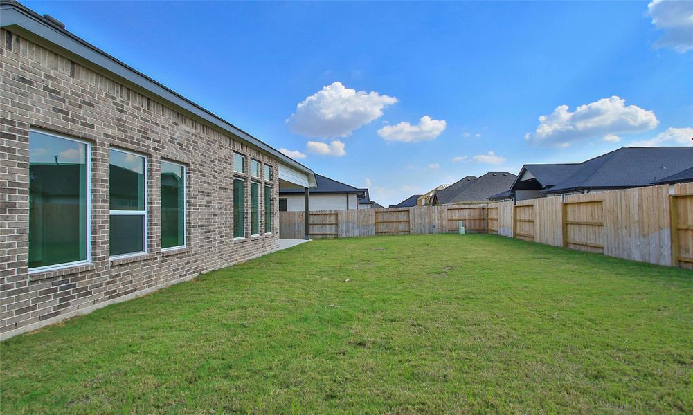 Exterior details and patio area of a home in Brookewater, Rosenberg (Image 14). Exterior details and patio area of a home in Brookewater, Rosenberg (Image 14).
