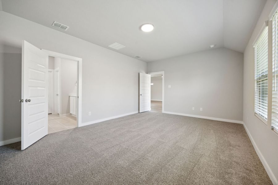 Primary Suite in the Oscar home plan by Trophy Signature Homes – REPRESENTATIVE PHOTO Primary Suite in the Oscar home plan by Trophy Signature Homes – REPRESENTATIVE PHOTO