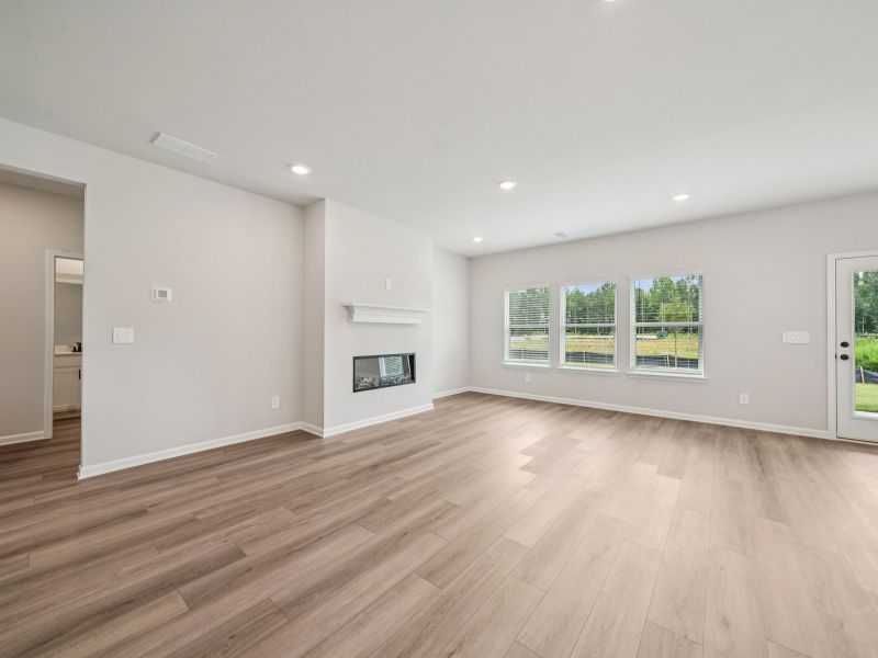 Spacious, unfurnished interior of a new home in Vines at Mill Creek - Estate Series, Braselton (Image 14).