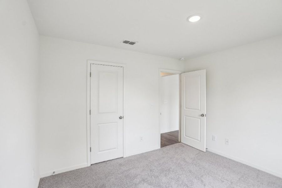 A room with white doors.