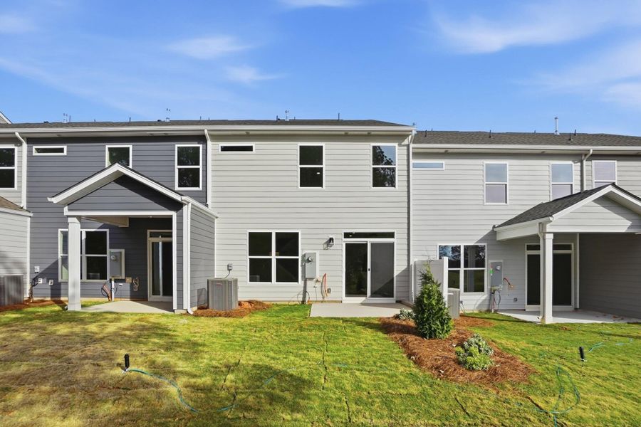 Exterior details and patio area of a home in Blythe Mill Townhomes, Waxhaw (Image 3). Exterior details and patio area of a home in Blythe Mill Townhomes, Waxhaw (Image 3).
