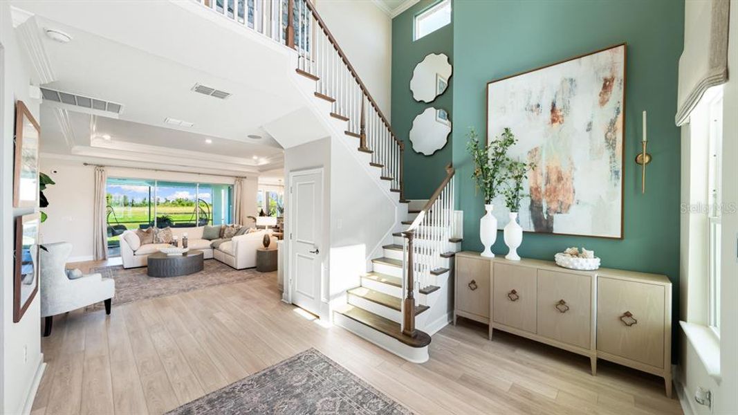 Furnished interior view inside a new home in Coasterra Community Group Page, Palmetto (Image 9).