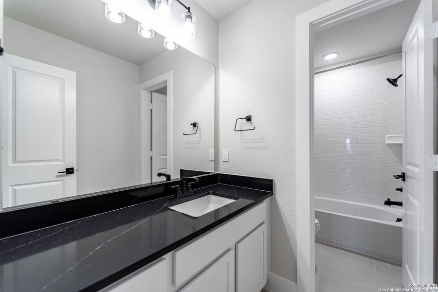 Furnished interior view inside a new home in The Woodlands at Medina Hills, Mico (Image 10).