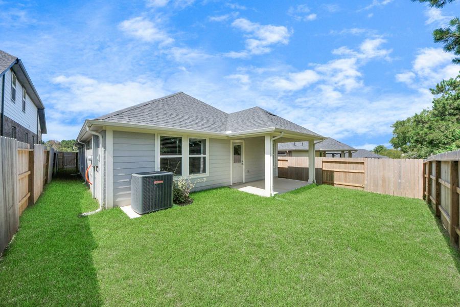 Exterior details and patio area of a home in Montgomery Ridge: Landmark Collection, Montgomery (Image 4). Exterior details and patio area of a home in Montgomery Ridge: Landmark Collection, Montgomery (Image 4).
