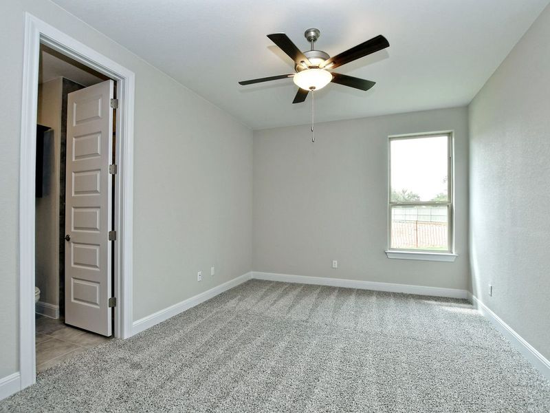 Representative unfurnished interior of a home built from the Madera II by Giddens Homes in Scofield Farms Estates, Georgetown (Image 379).