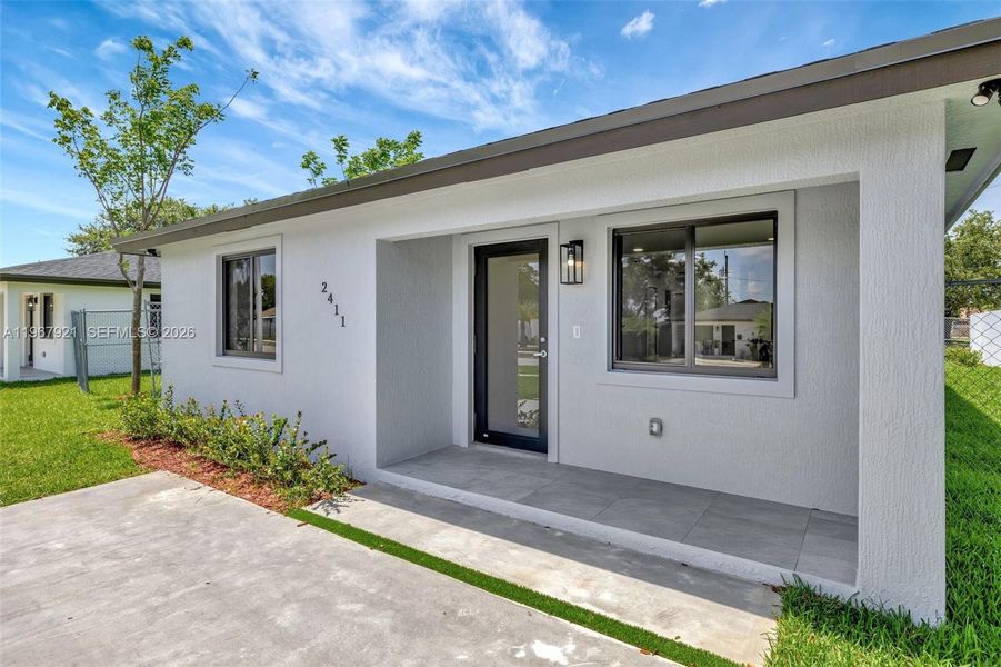 Exterior details and patio area of a home in , Miami Gardens (Image 3).