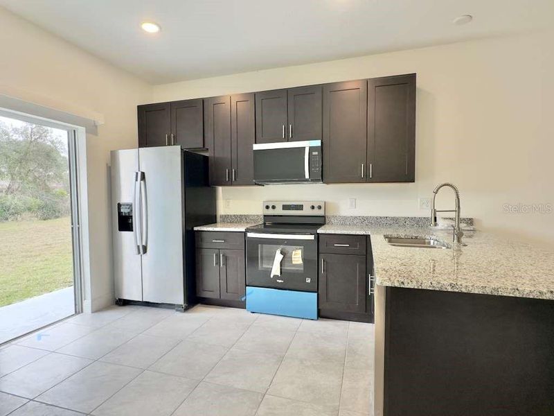 Furnished interior view inside a new home in , Ocala (Image 11).