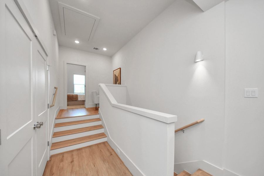 Upstairs landing with access to the washer and dryer. Upstairs landing with access to the washer and dryer.