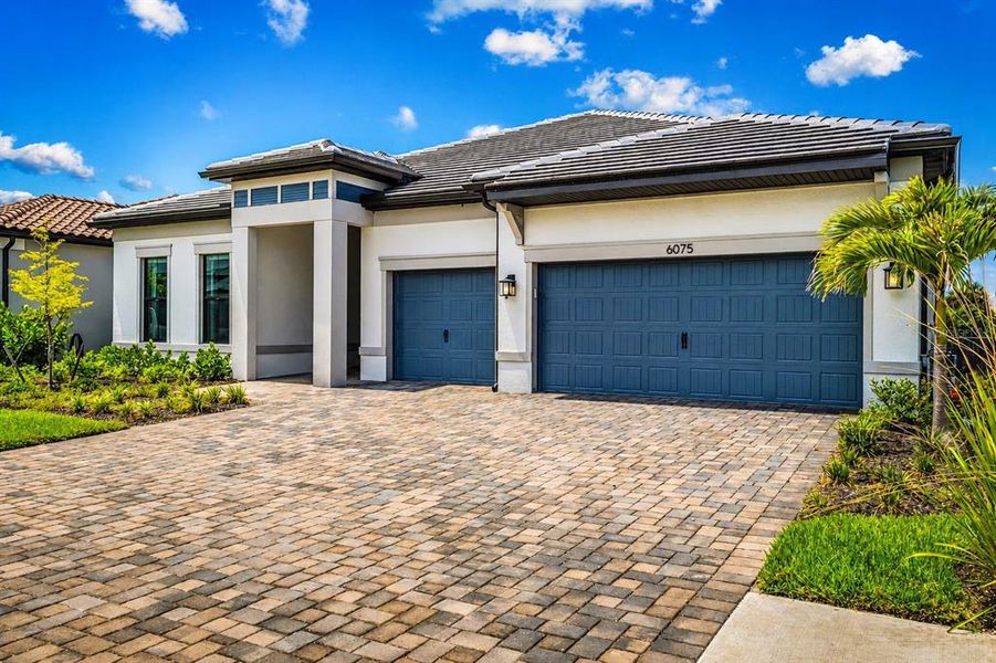 Front exterior of a new home in , Nokomis, FL, highlighting curb appeal (Image 26). Front exterior of a new home in , Nokomis, FL, highlighting curb appeal (Image 26).