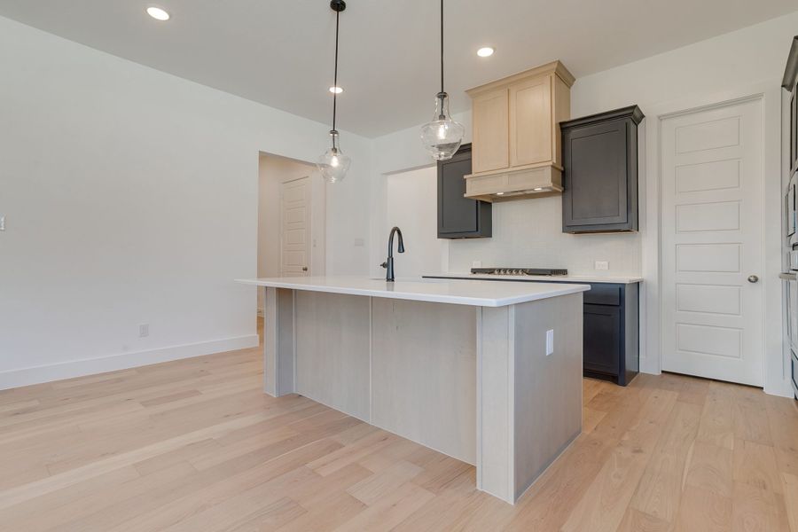 Representative furnished interior of a home built from the Longview by Graham Hart Home Builder in Bear Ridge, Burleson (Image 6).