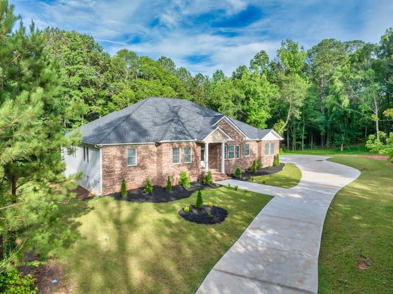Front exterior of a new home in , Oxford, GA, highlighting curb appeal (Image 37). Front exterior of a new home in , Oxford, GA, highlighting curb appeal (Image 37).