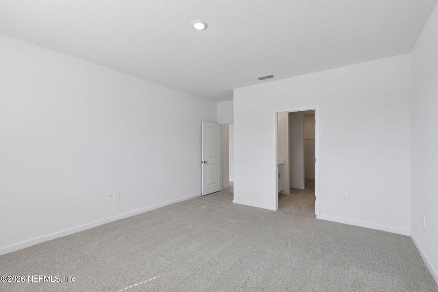 Spacious, unfurnished interior of a new home in Colbert Landings, Palm Coast (Image 34).
