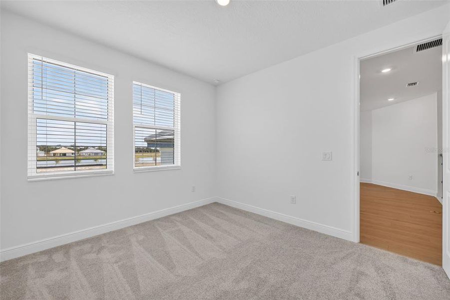 Spacious, unfurnished interior of a new home in Hawkstone, Sarasota (Image 31).