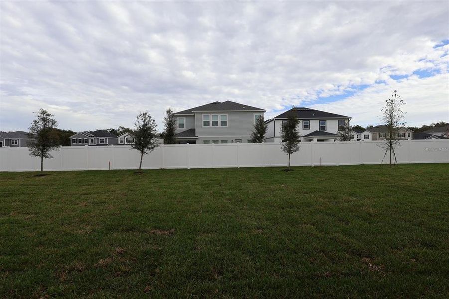 Exterior details and patio area of a home in Estates at Rivercrest, Sanford (Image 11). Exterior details and patio area of a home in Estates at Rivercrest, Sanford (Image 11).