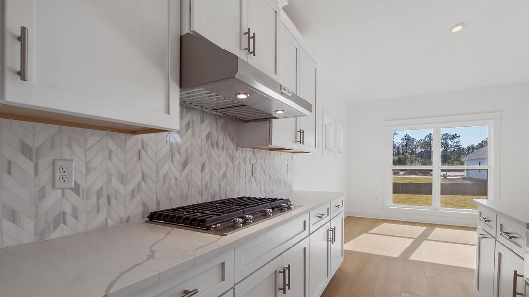 Representative furnished interior of a home built from the Camellia by D.R. Horton in Breakfast Point East Phase II, Panama City Beach (Image 6).