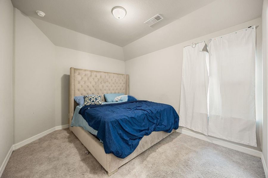 Furnished interior view inside a new home in Sunterra 60ft, Katy (Image 18).