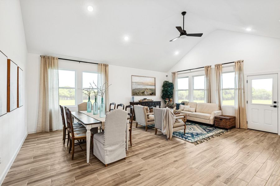 Open living area with vaulted ceilings (*Photo not of actual home and used for illustration purposes only.)