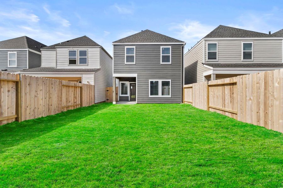 Exterior details and patio area of a home in Grand West, Houston (Image 4).