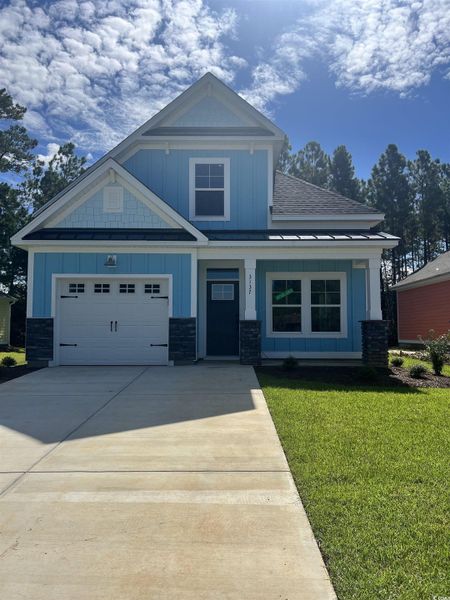 Front exterior of a new home in White Oak Estates, Conway, SC, highlighting curb appeal (Image 3). Front exterior of a new home in White Oak Estates, Conway, SC, highlighting curb appeal (Image 3).