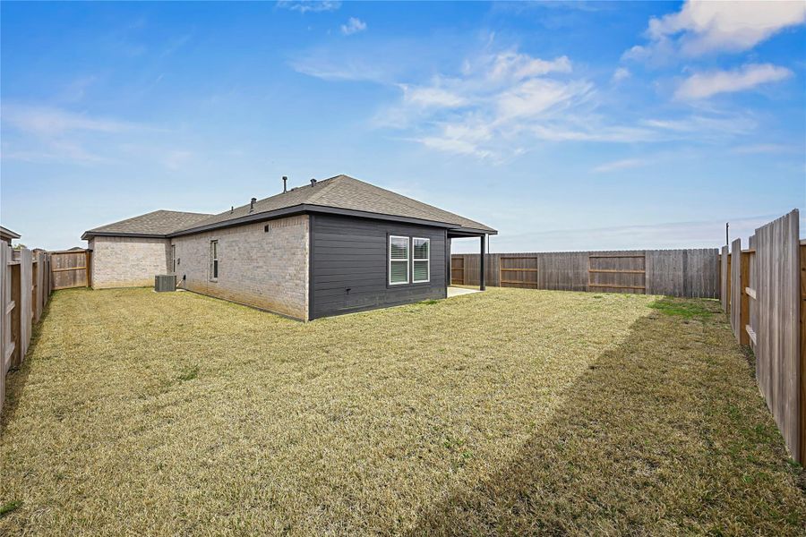Exterior details and patio area of a home in River Ranch Meadows, Dayton (Image 3).