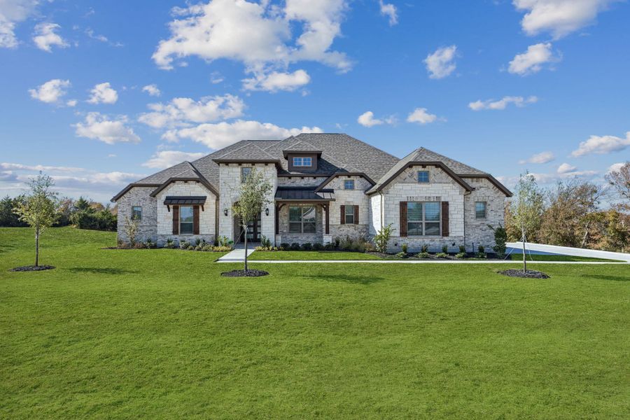 Front exterior of a new home in Lakeway Estates, Waxahachie, TX, highlighting curb appeal (Image 15). Front exterior of a new home in Lakeway Estates, Waxahachie, TX, highlighting curb appeal (Image 15).