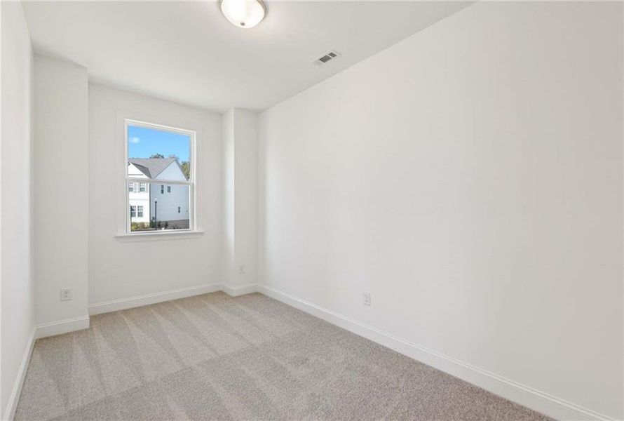 Spacious, unfurnished interior of a new home in East Harbor II at Chestatee, Dawsonville (Image 48).