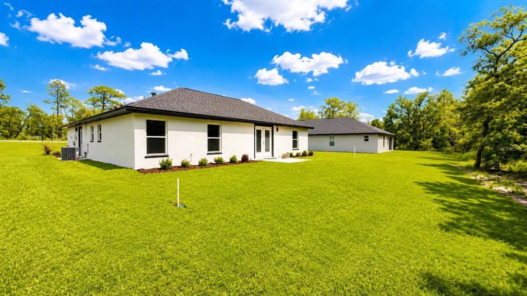Exterior details and patio area of a home in , Brooksville (Image 4).