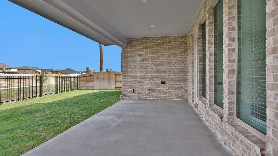 Exterior details and patio area of a home in Stonecreek Estates 50', Richmond (Image 11).