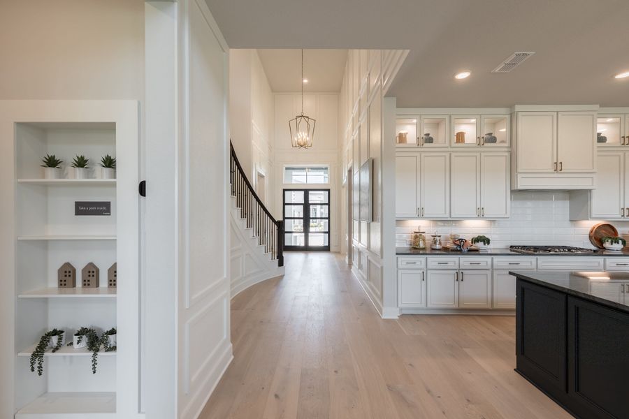 Representative furnished interior of a home built from the Woodbridge by Tri Pointe Homes in Bridgeland, Cypress (Image 31).