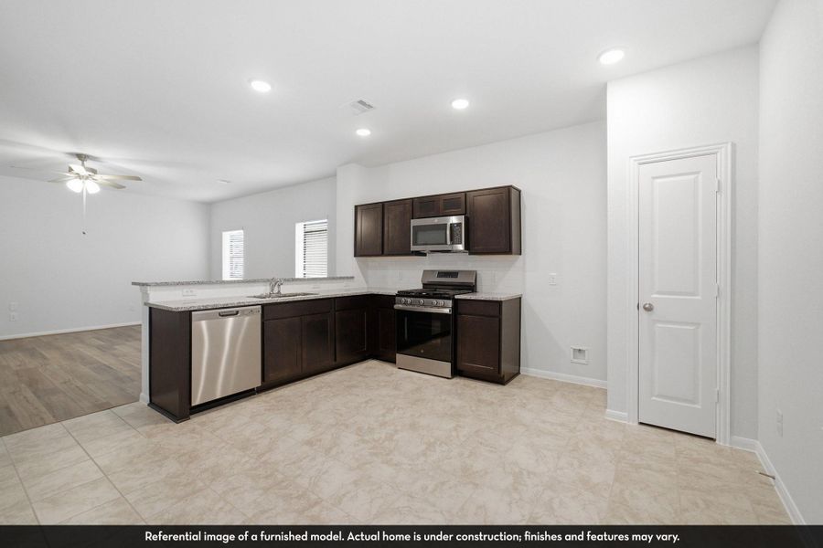 Furnished interior view inside a new home in Caney Mills, Conroe (Image 3). Furnished interior view inside a new home in Caney Mills, Conroe (Image 3).