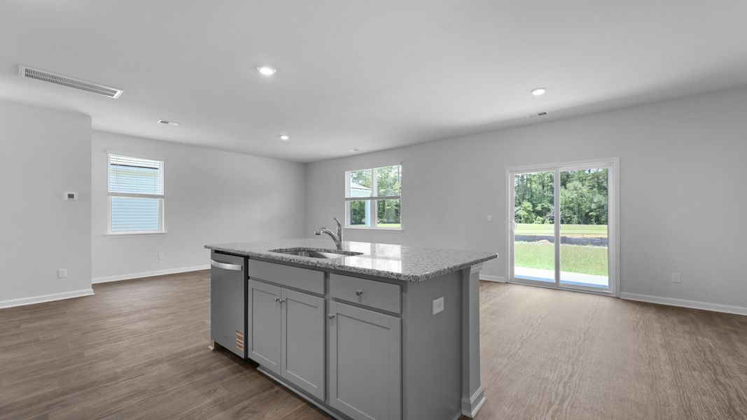 Representative furnished interior of a home built from the Aisle by D.R. Horton in Pine Hills at Cane Bay, Summerville (Image 5).