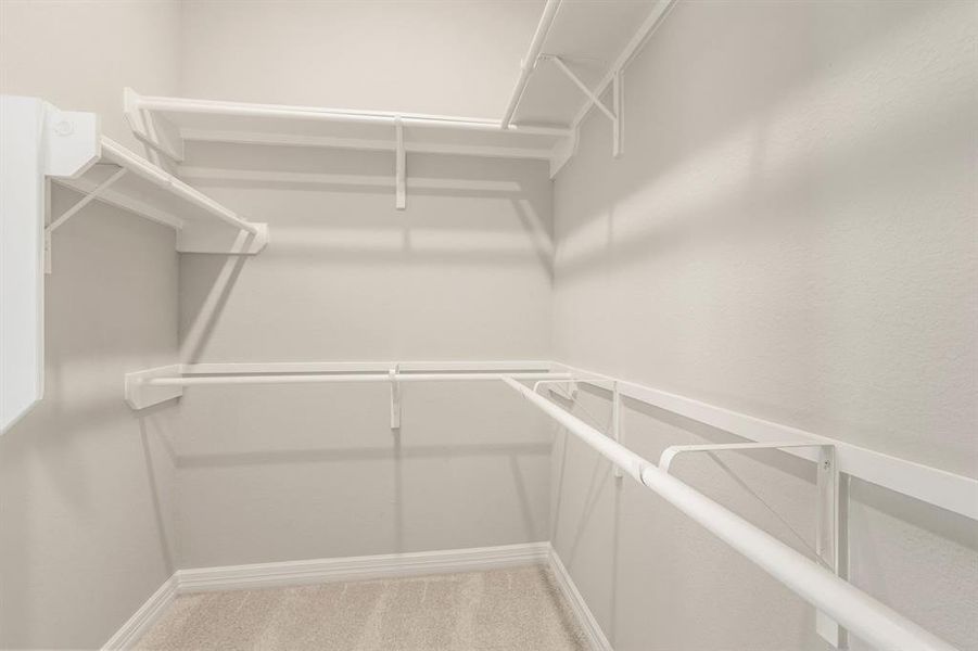 A view of your large primary walk-in Closet