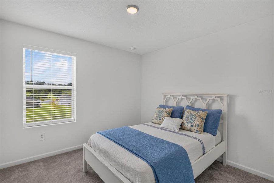 Furnished interior view inside a new home in Tara Forest East, Alachua (Image 37).