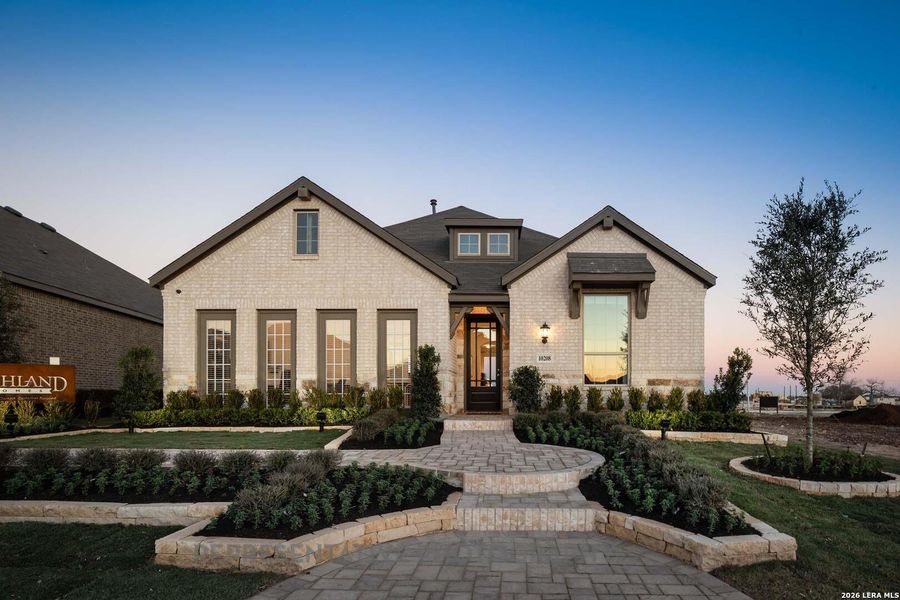 Front exterior of a new home in Davis Ranch, San Antonio, TX, highlighting curb appeal (Image 2).