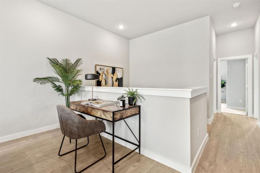 Home office featuring light wood-type flooring