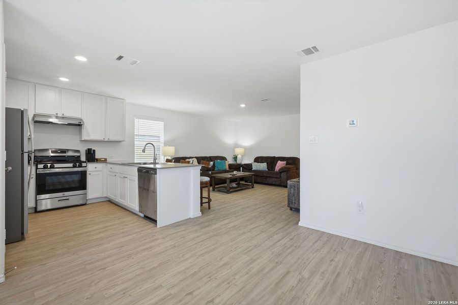 Furnished interior view inside a new home in Lodi Grove, Floresville (Image 9).