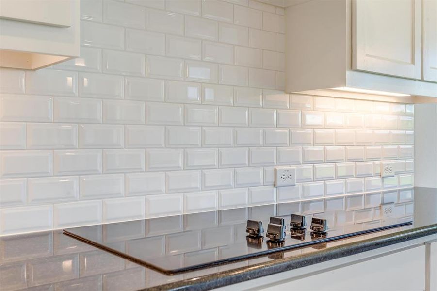 Room details with white cabinetry