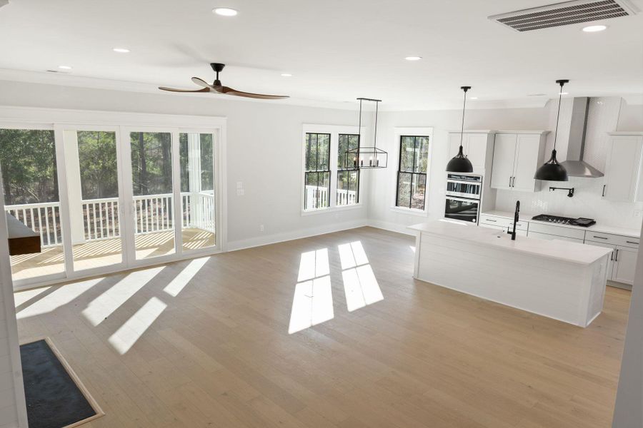 Spacious, unfurnished interior of a new home in Rivercroft, Awendaw (Image 20).