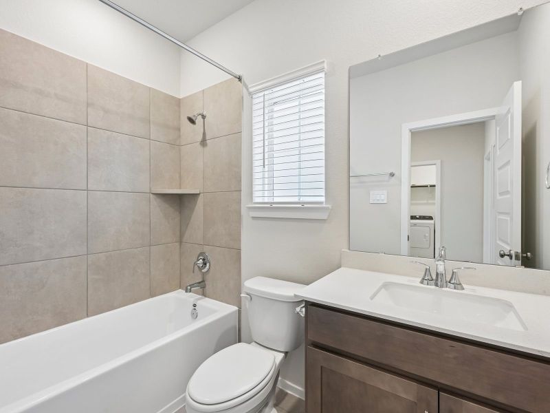 Furnished interior view inside a new home in Pinewood Trails - City Series, Atascocita (Image 9).