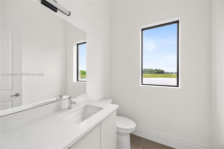 Modern vanity with an integrated sink and chrome faucet