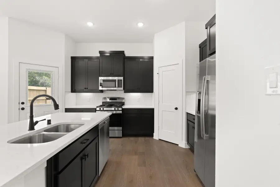 Furnished interior view inside a new home in The Woodlands Hills, Willis (Image 8). Furnished interior view inside a new home in The Woodlands Hills, Willis (Image 8).