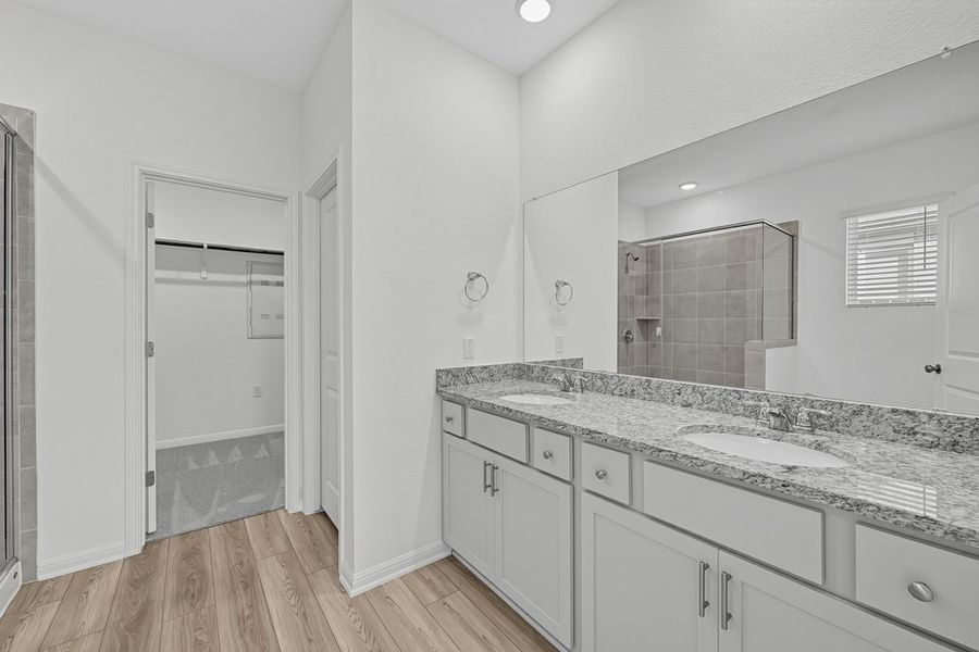 Representative furnished interior of a home built from the Warbler by Taylor Morrison in Longview, Del Valle (Image 5).
