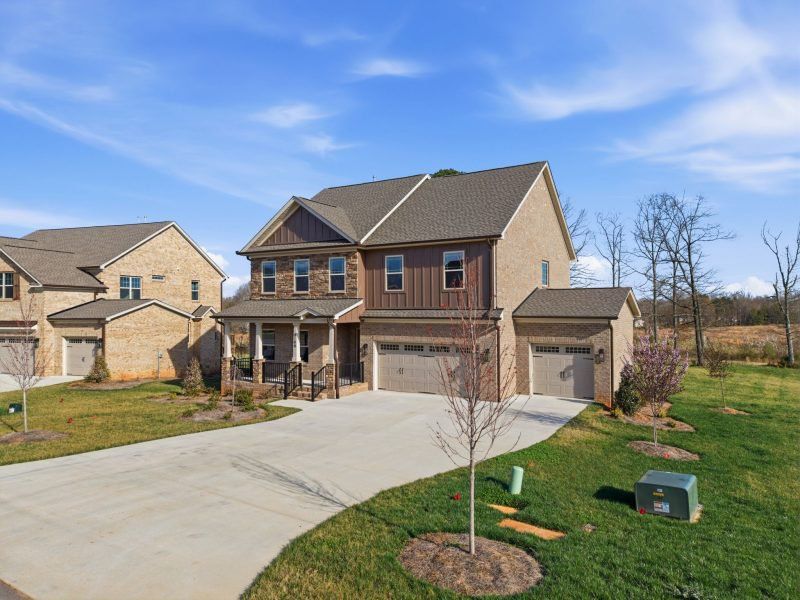 Front exterior of a new home in Blacksmith, Stokesdale, NC, highlighting curb appeal (Image 34).
