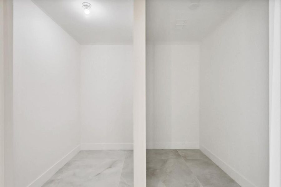 PRIMARY WALK IN CLOSET