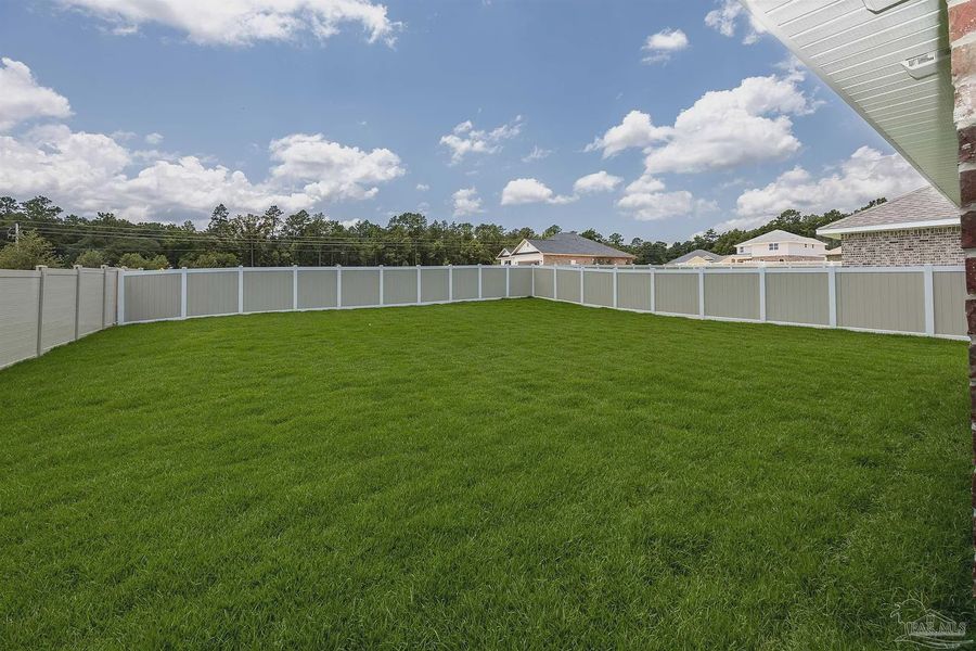 Exterior details and patio area of a home in Parkland Place, Pace (Image 20).