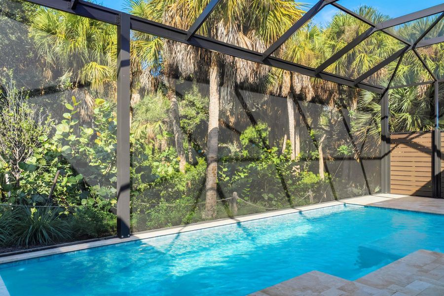 Exterior details and patio area of a home in Seaglass, Wabasso Beach (Image 4).