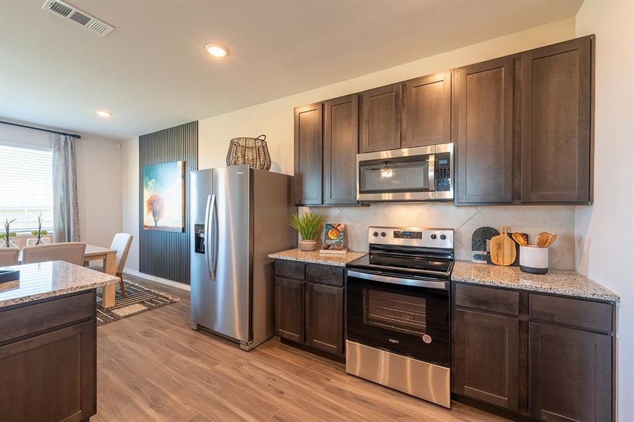 Furnished interior view inside a new home in Retreat at Fossil Creek, Fort Worth (Image 11).